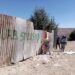 Alcaldía y vecinos retiran vallas de calamina colocadas por loteadores